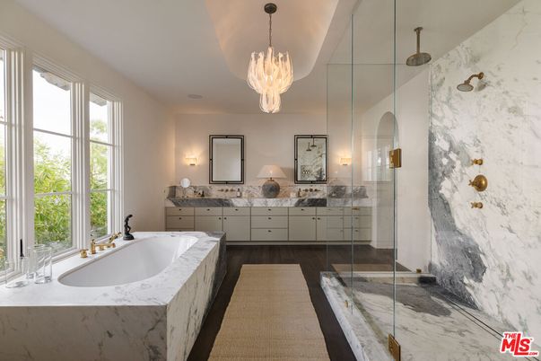 Bathroom, Chandelier, Dual Sink Vanities, Glass Shower, Interior, Marble Walls, Wood Texture Flooring