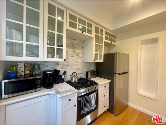 Interior, Kitchen, Stainless Steel Appliances, Stone Walls, Washer, Wood Texture Flooring