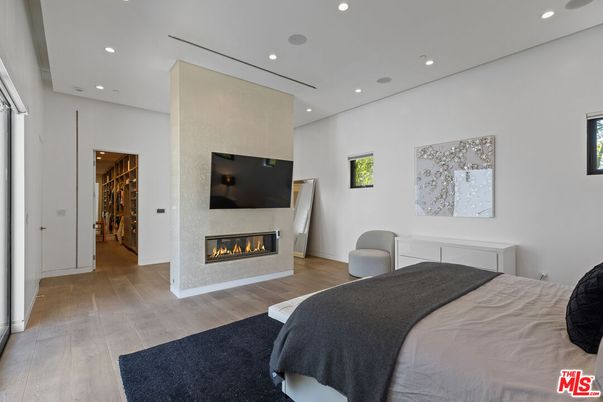 Bedroom, Fireplace, Interior, Recessed Lighting, Wood Texture Flooring