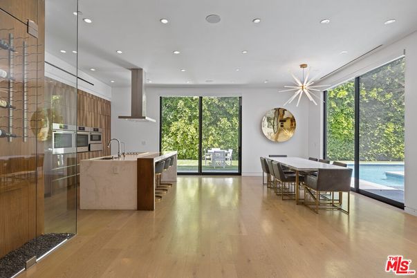 Dining room, Interior, Kitchen, Pendant Lights, Recessed Lighting, Stainless Steel Appliances, Wood Texture Flooring