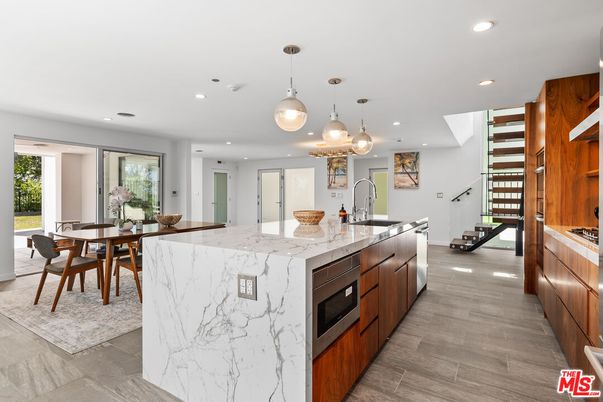 Dining room, Interior, Kitchen, Pendant Lights, Recessed Lighting, Stainless Steel Appliances, Wood Texture Flooring