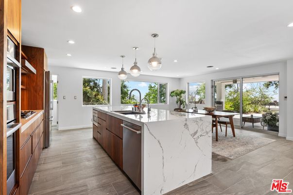 Dining room, Interior, Kitchen, Pendant Lights, Recessed Lighting, Stainless Steel Appliances, Wood Texture Flooring