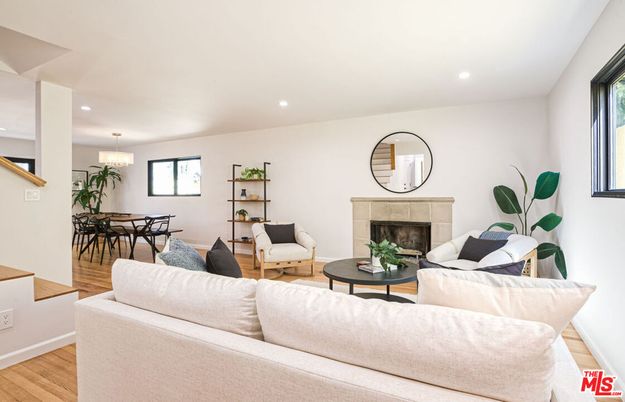 Chandelier, Dining room, Fireplace, Interior, Living room, Recessed Lighting, Wood Texture Flooring