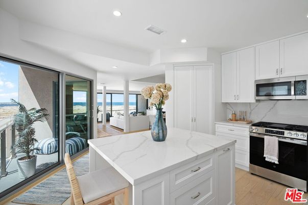 Interior, Kitchen, Recessed Lighting, Stainless Steel Appliances, Water, Wood Texture Flooring