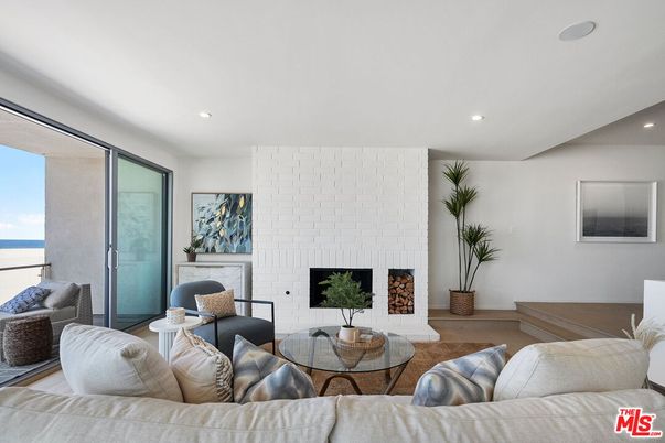Fireplace, Interior, Living room, Recessed Lighting, Stone Walls, Water