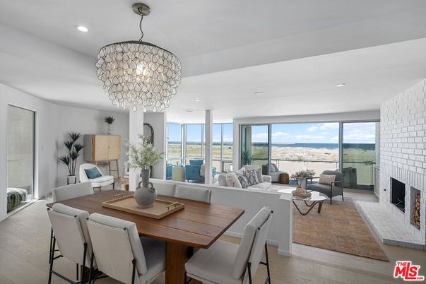 Chandelier, Dining room, Fireplace, Interior, Living room, Recessed Lighting, Water, Wood Texture Flooring