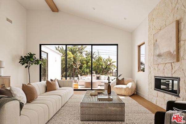Fireplace, Interior, Living room, Recessed Lighting, Stone Walls, Wooden Beams, Wood Texture Flooring
