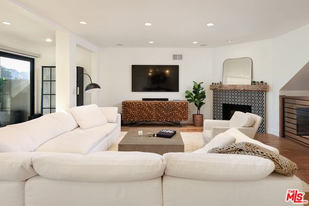 Fireplace, Interior, Living room, Recessed Lighting, Wood Texture Flooring