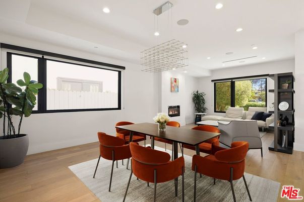 Dining room, Fireplace, Interior, Living room, Pendant Lights, Recessed Lighting, Wood Texture Flooring