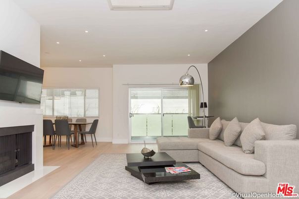 Dining room, Fireplace, Interior, Living room, Recessed Lighting, Wood Texture Flooring