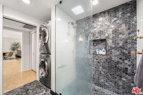 Bathroom, Glass Shower, Interior, Recessed Lighting, Utility Closets, Washer, Wood Texture Flooring