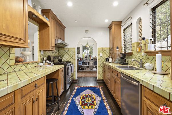 Interior, Kitchen, Pendant Lights, Recessed Lighting, Tile Countertops, Wood Texture Flooring