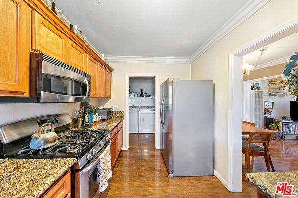 Chandelier, Dining room, Interior, Kitchen, Stainless Steel Appliances, Wood Texture Flooring