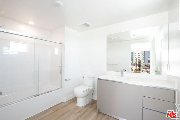 Bathroom, Glass Shower, Interior, Recessed Lighting, Wood Texture Flooring