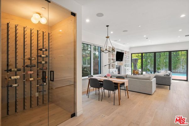 Dining room, Interior, Living room, Pendant Lights, Recessed Lighting, Wine Storage, Wood Texture Flooring, Wooden Walls