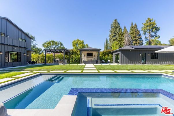 Exterior, Pool, Solar Panels