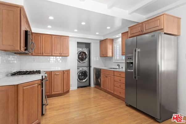 Interior, Kitchen, Recessed Lighting, Stainless Steel Appliances, Washer, Wood Texture Flooring
