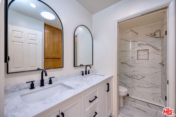 Bathroom, Dual Sink Vanities, Interior, Marble, Marble Walls, Recessed Lighting
