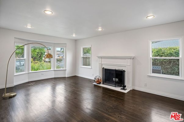 Empty room, Fireplace, Interior, Recessed Lighting, Wood Texture Flooring