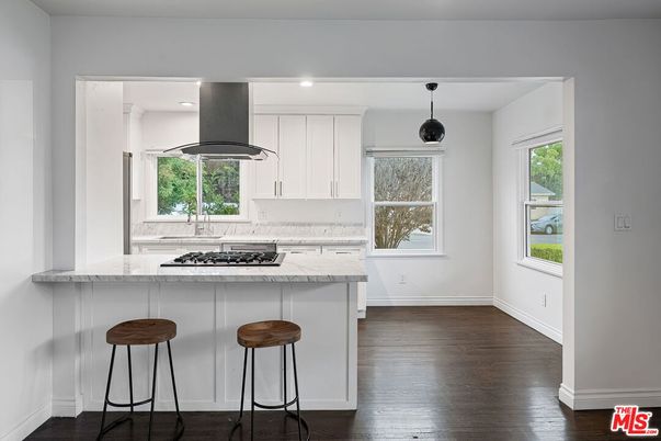 Interior, Kitchen, Marble Walls, Pendant Lights, Recessed Lighting, Wood Texture Flooring