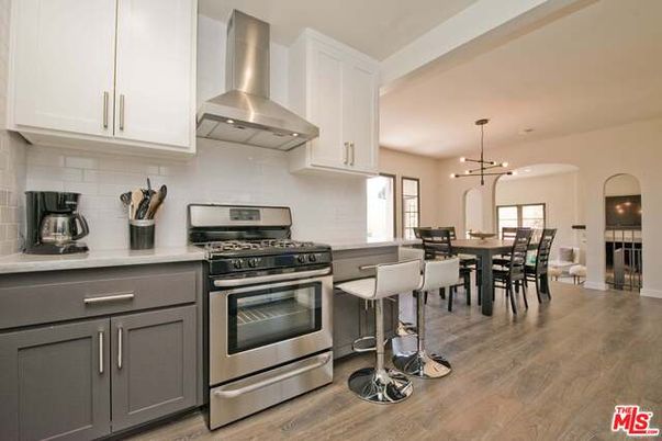 Dining room, Interior, Kitchen, Pendant Lights, Stainless Steel Appliances, Wood Texture Flooring
