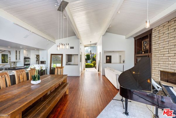 Dining room, Fireplace, Interior, Kitchen, Pendant Lights, Piano, Recessed Lighting, Stone Walls, Wood Texture Flooring