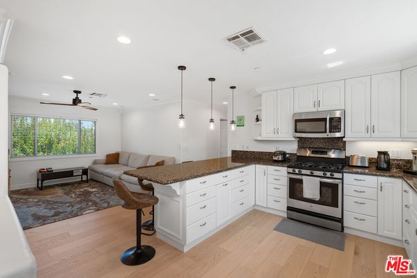 Interior, Kitchen, Pendant Lights, Recessed Lighting, Stainless Steel Appliances, Wood Texture Flooring