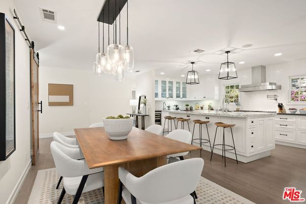 Dining room, Interior, Kitchen, Pendant Lights, Recessed Lighting, Stainless Steel Appliances, Wood Texture Flooring