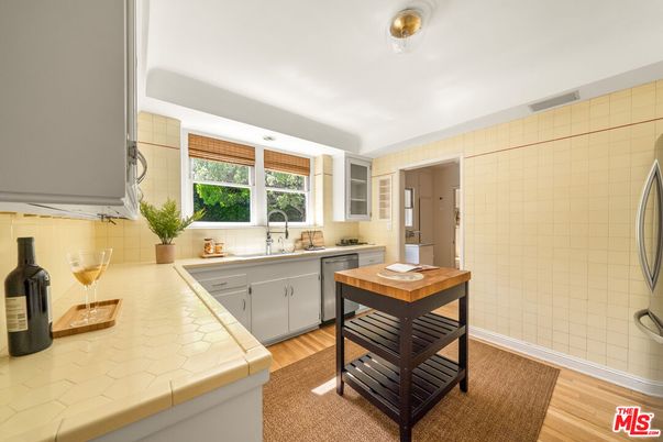 Interior, Kitchen, Tile Countertops, Wood Texture Flooring