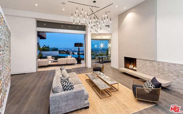 Fireplace, Interior, Living room, Pendant Lights, Recessed Lighting, Water, Wood Texture Flooring