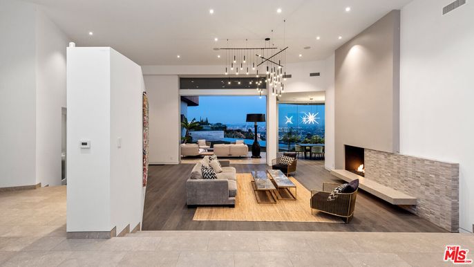 Fireplace, Interior, Living room, Pendant Lights, Recessed Lighting, Water, Wood Texture Flooring