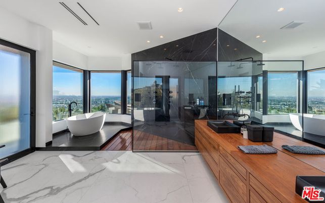 Bathroom, Dual Sink Vanities, Free Standing Baths, Glass Shower, Interior, Marble, Marble Walls, Recessed Lighting
