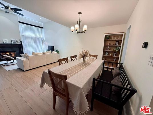 Chandelier, Dining room, Fireplace, Interior, Living room, Wood Texture Flooring