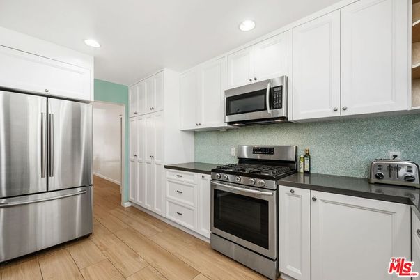 Interior, Kitchen, Recessed Lighting, Stainless Steel Appliances, Wood Texture Flooring