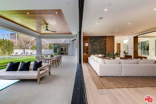 Dining room, Fireplace, Interior, Living room, Recessed Lighting, Stone Walls, Wooden Ceilings, Wood Texture Flooring