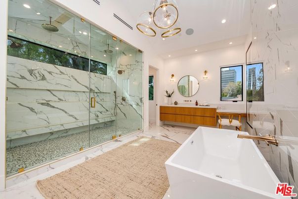 Bathroom, Free Standing Baths, Glass Shower, Interior, Marble, Marble Walls, Pendant Lights, Recessed Lighting