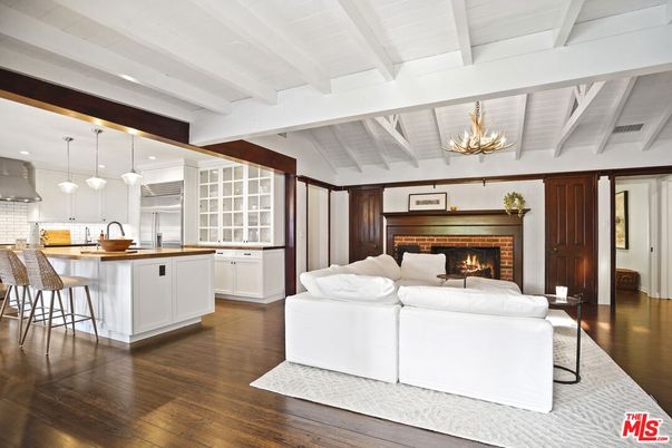 Chandelier, Fireplace, Interior, Kitchen, Living room, Pendant Lights, Recessed Lighting, Wood Texture Flooring