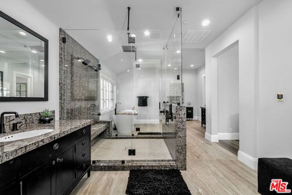 Bathroom, Dual Sink Vanities, Free Standing Baths, Glass Shower, Interior, Recessed Lighting, Wood Texture Flooring