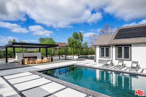 Exterior, Fireplace, Pool, Solar Panels