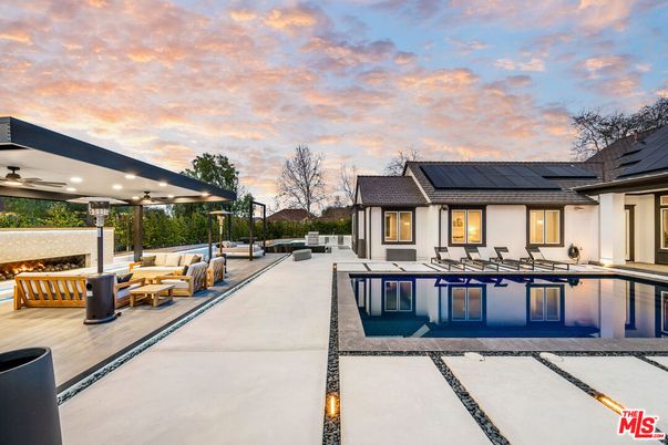 Exterior, Pool, Solar Panels