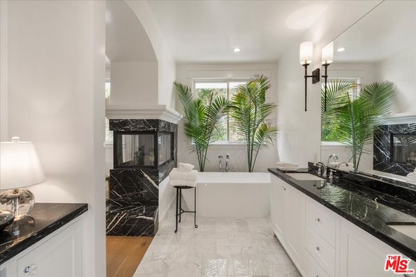 Bathroom, Dual Sink Vanities, Fireplace, Interior, Marble, Recessed Lighting, Wood Texture Flooring