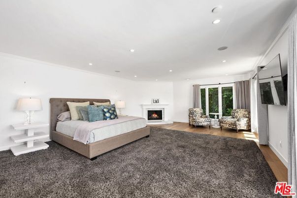 Bedroom, Fireplace, Interior, Recessed Lighting, Wood Texture Flooring