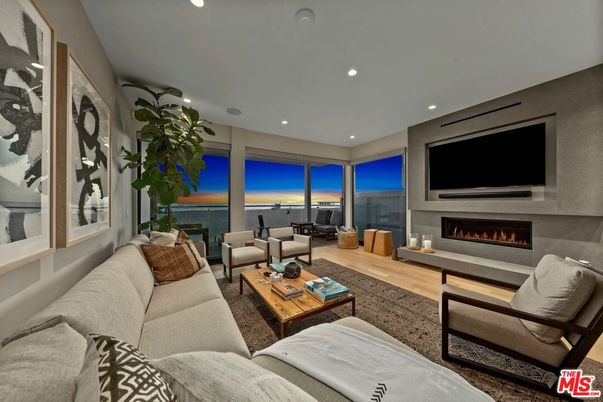 Fireplace, Interior, Living room, Recessed Lighting, Water, Wood Texture Flooring
