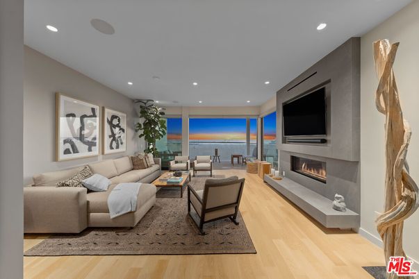 Fireplace, Interior, Living room, Recessed Lighting, Water, Wood Texture Flooring