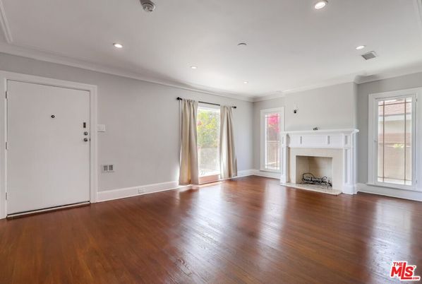 Empty room, Fireplace, Interior, Recessed Lighting, Wood Texture Flooring
