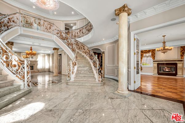 Chandelier, Fireplace, Interior, Marble, Recessed Lighting, Wood Texture Flooring