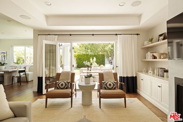 Dining room, Fireplace, Interior, Living room, Recessed Lighting, Wood Texture Flooring