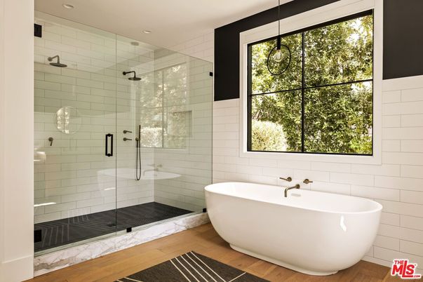 Bathroom, Free Standing Baths, Glass Shower, Interior, Pendant Lights, Recessed Lighting, Wood Texture Flooring