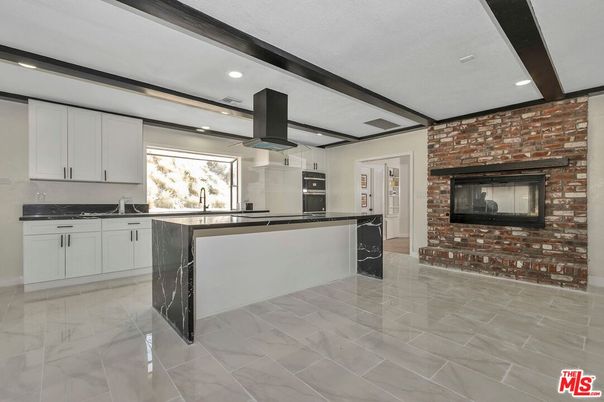 Fireplace, Interior, Kitchen, Marble, Recessed Lighting, Stone Walls