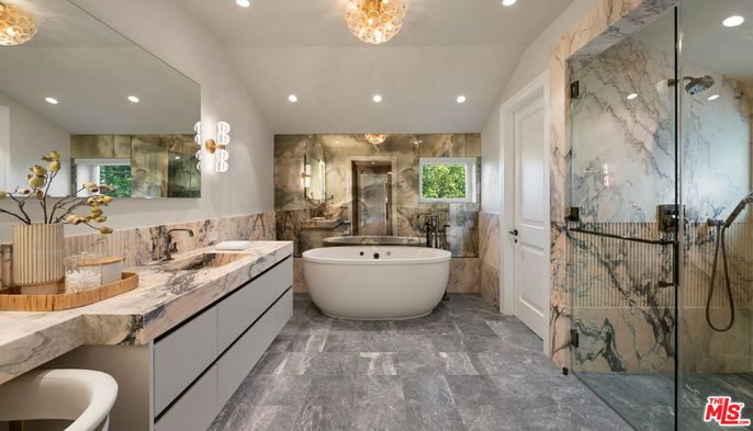 Bathroom, Dual Sink Vanities, Free Standing Baths, Glass Shower, Interior, Marble Walls, Recessed Lighting